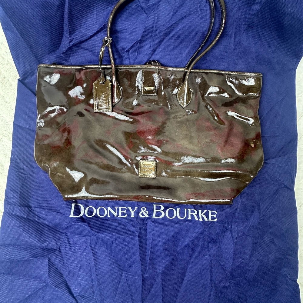DOONEY & BOURKE, RARE, GENUINE LEATHER, YOU WILL NEVER SEE THIS AGAIN
